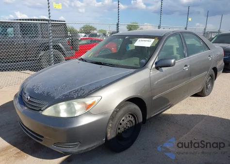 2003 Toyota Camry Le z USA, uszkodzony, nr VIN 4T1BE30K13U725595